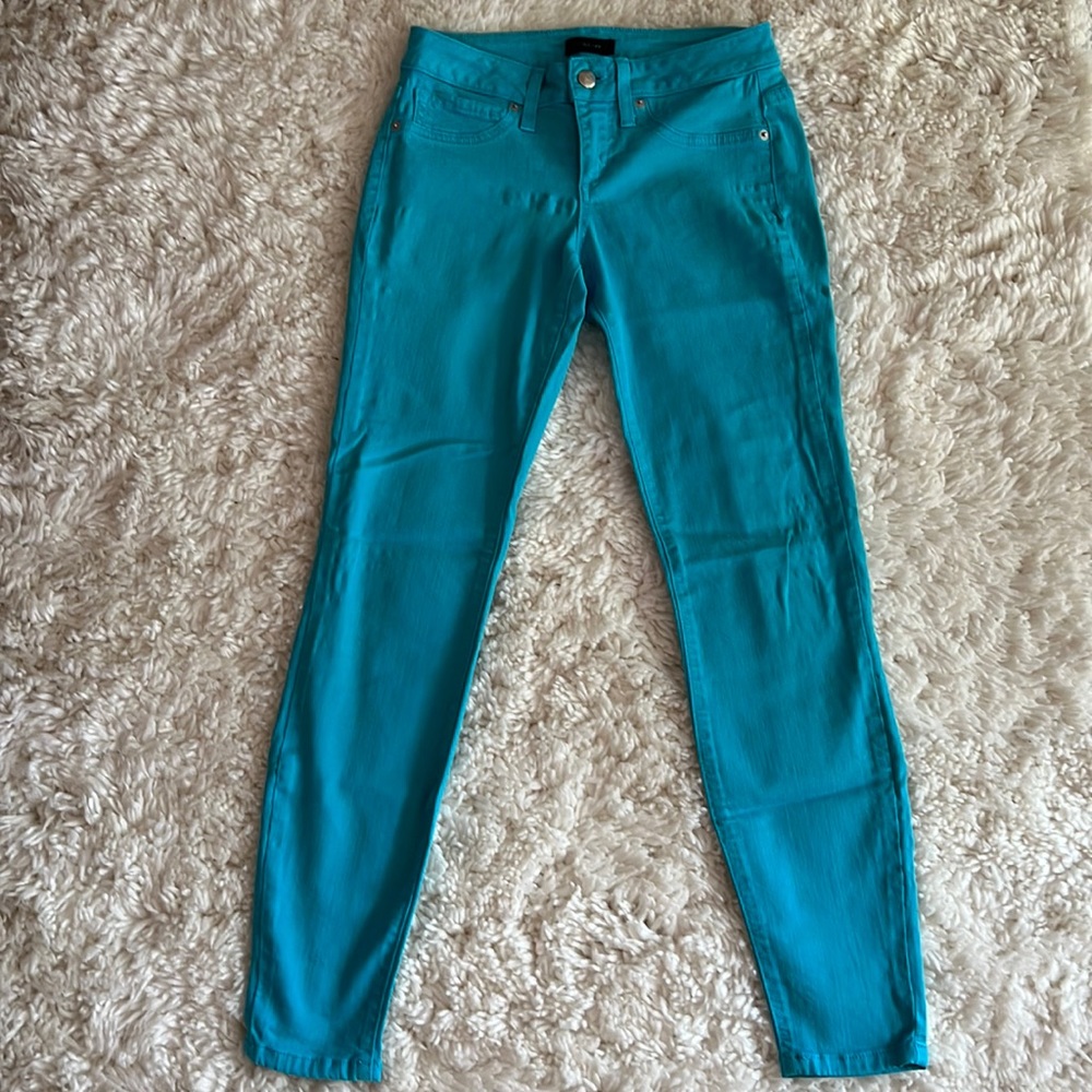 Bebe turquoise/ teal skinny jeans. SIZE: 27